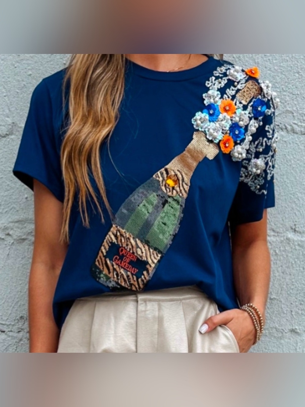 Queen of Sparkles Blue and Orange Popping Champagne T-shirt Small